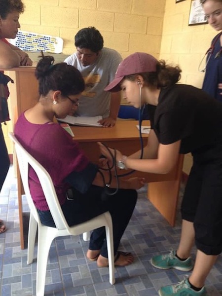 nurse taking blood pressure